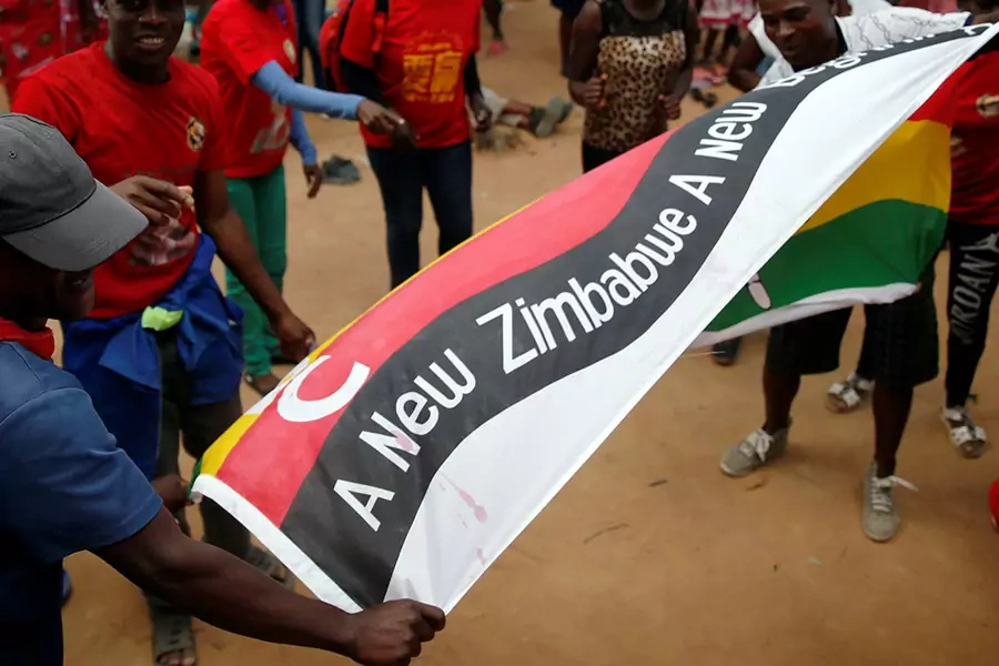 Opposition Movement for Democratic Cahne (MDC) party supporters wave flags at a rally to launch their election campaign in Harare, Zimbabwe, January 21, 2018. 