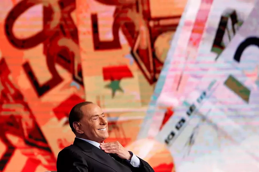 Italy's former Prime Minister Silvio Berlusconi smiles during the taping of the television talk show "Porta a Porta" (Door to Door) in Rome, Italy, on January 11, 2018.