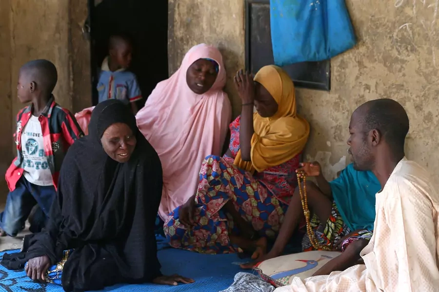 Relatives of missing school girls react in Dapchi in the northeastern state of Yobe, after an attack on the village by Boko Haram, Nigeria February 23, 2018. 