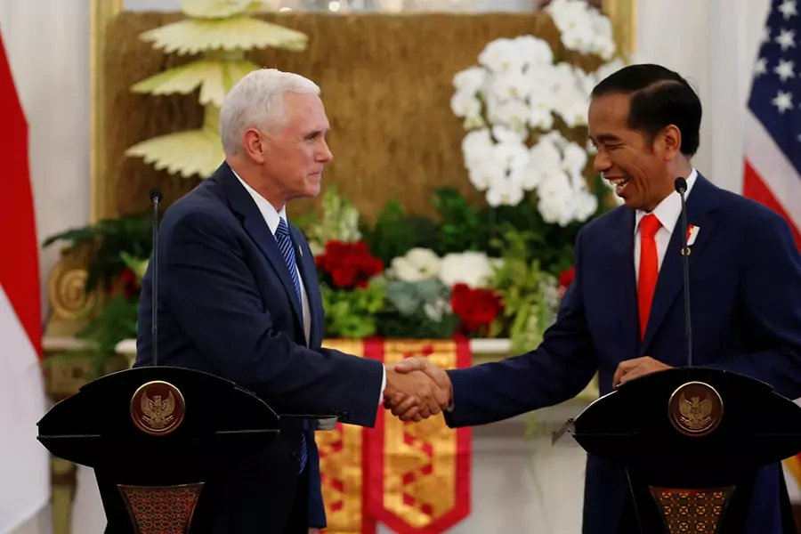 U.S. Vice President Mike Pence shakes hands with Indonesia's President Joko Widodo at the Presidential Palace in Jakarta, Indonesia, on April 20, 2017.