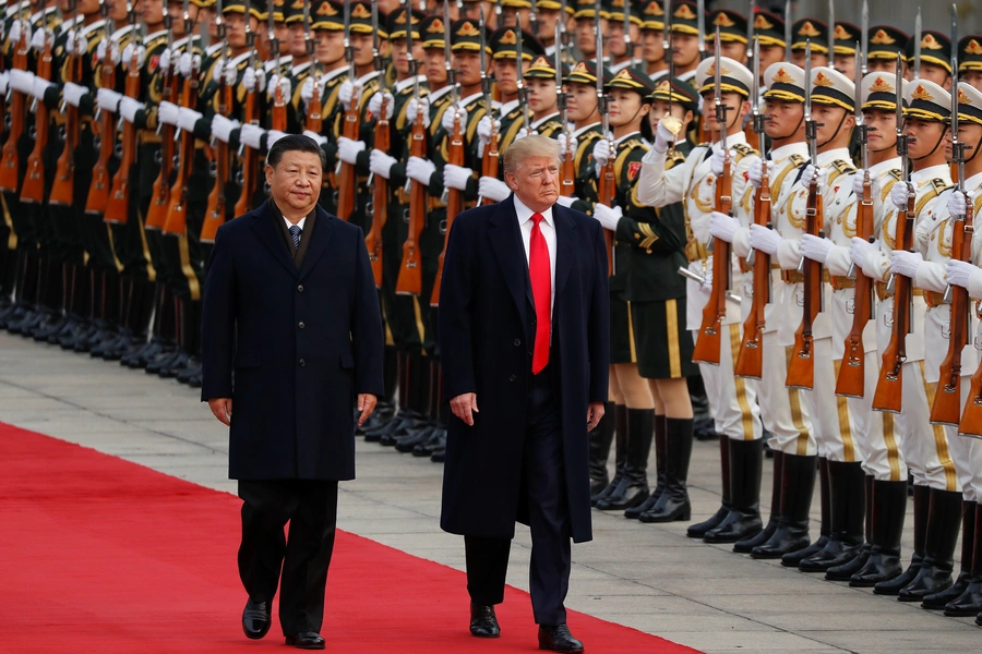 U.S. President Donald Trump takes part in a welcoming ceremony with China's President Xi Jinping in Beijing, China, November 9, 2017.