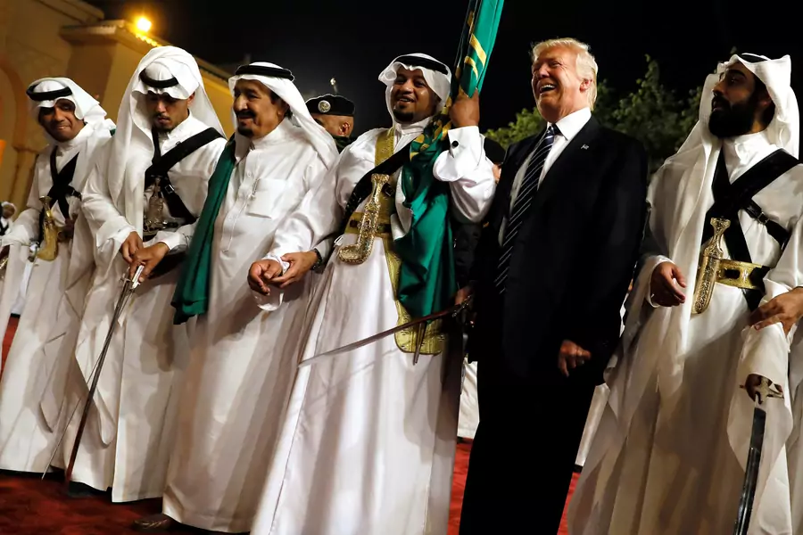 U.S. President Donald Trump dances with a sword as he arrives to a welcome ceremony by Saudi Arabia's King Salman bin Abdulaziz Al Saud at Al Murabba Palace in Riyadh