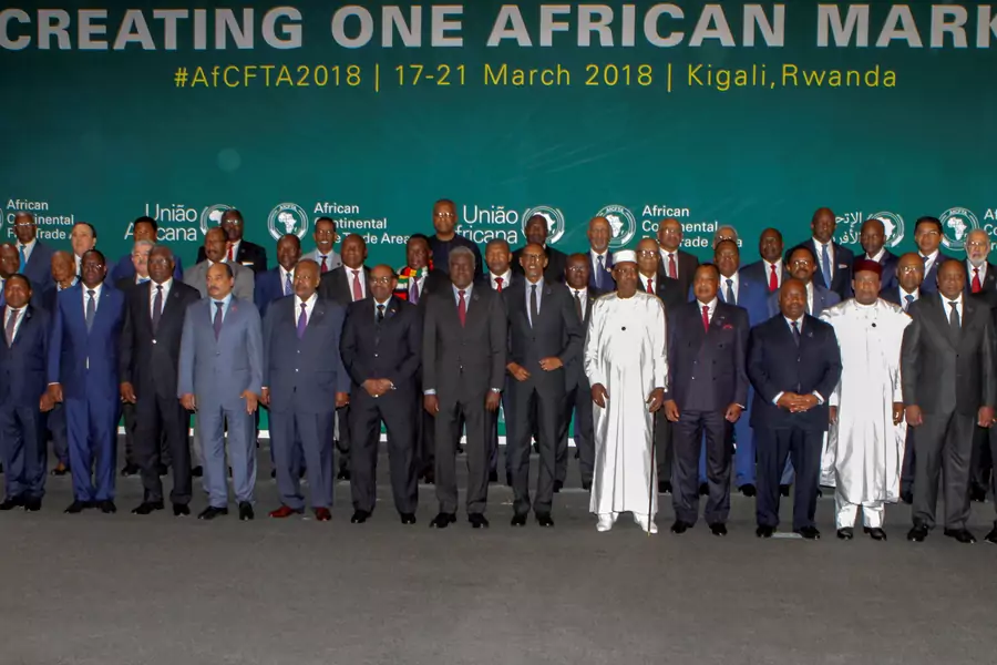 African leaders pose for a group photograph as they meet to sign a free trade deal that would create a liberalized market for goods and services across the continent, in Kigali, Rwanda, March 21, 2018. 