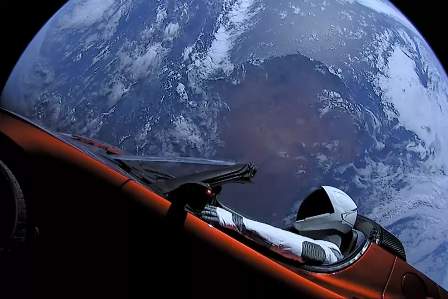 A Tesla Roadster automobile floats through space after it was carried there by SpaceX's Falcon Heavy. 