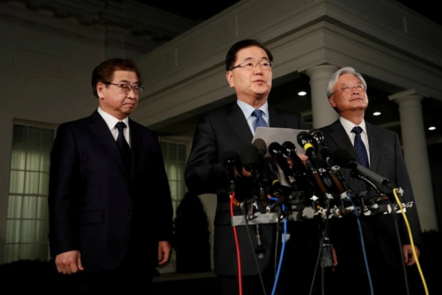South Korean officials, Chung Eui-yong, Cho Yoon-je, and Suh Hoon, make an announcement about North Korea and the Trump administration outside of the West Wing at the White House in Washington, U.S. March 8, 2018.