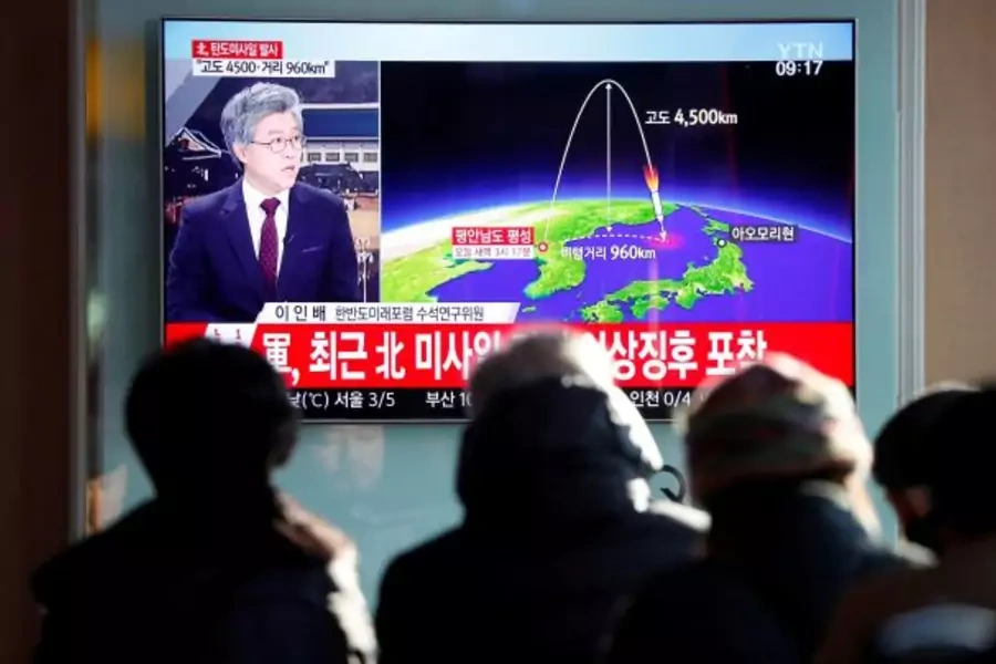 People watch a television broadcast of a news report on North Korea firing what appeared to be an intercontinental ballistic missile (ICBM) that landed close to Japan, in Seoul, South Korea, November 29, 2017. 