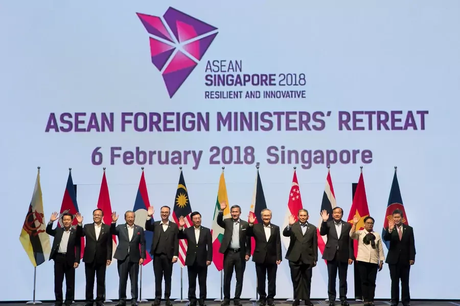 Foreign ministers pose for a group photo at the Association of Southeast Asian Nations (ASEAN) Foreign Ministers' Meeting retreat in Singapore on February 6, 2018.