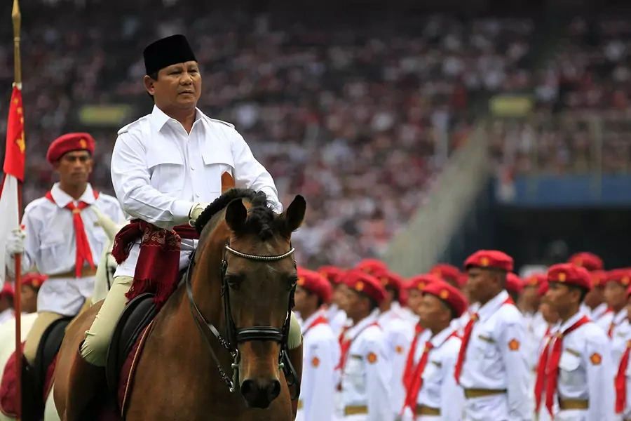 Prabowo Subianto rides a horse during a Gerindra Party campaign rally at a stadium in Jakarta, Indonesia on March 23, 2014.