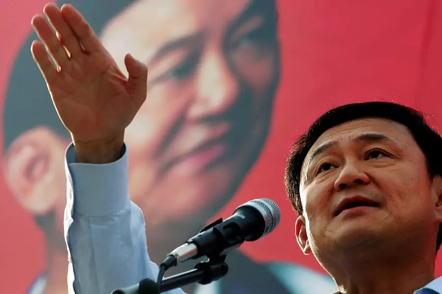 Former Thai Prime Minister Thaksin Shinawatra speaks during an election campaign rally in the southern island of Phuket February 1, 2005.