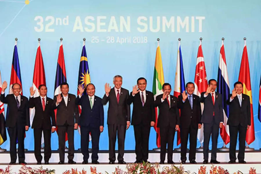 ASEAN leaders take a group photo ahead of the opening ceremony of the 32nd ASEAN Summit in Singapore on April 28, 2018. 