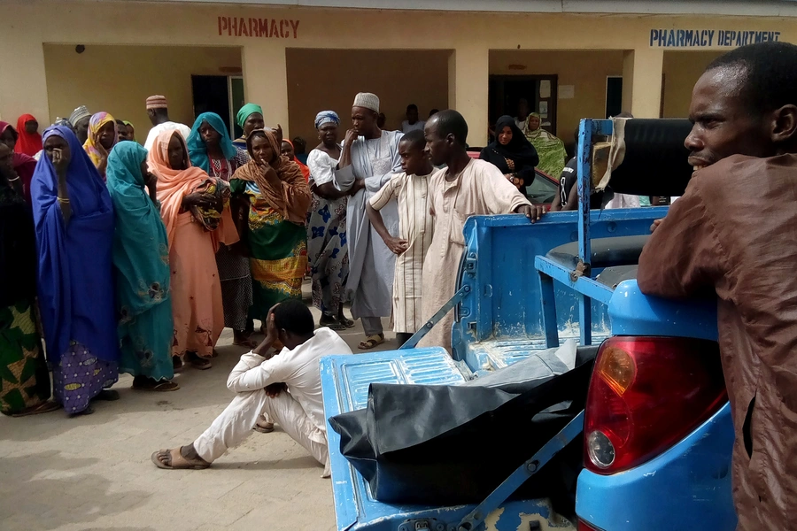 A man reacts as dead bodies are brought to a hospital after a suspected Boko Haram attack on the edge of Maiduguri's inner city, Nigeria April 2, 2018. Despite the split, attacks are still common in northeastern Nigeria.