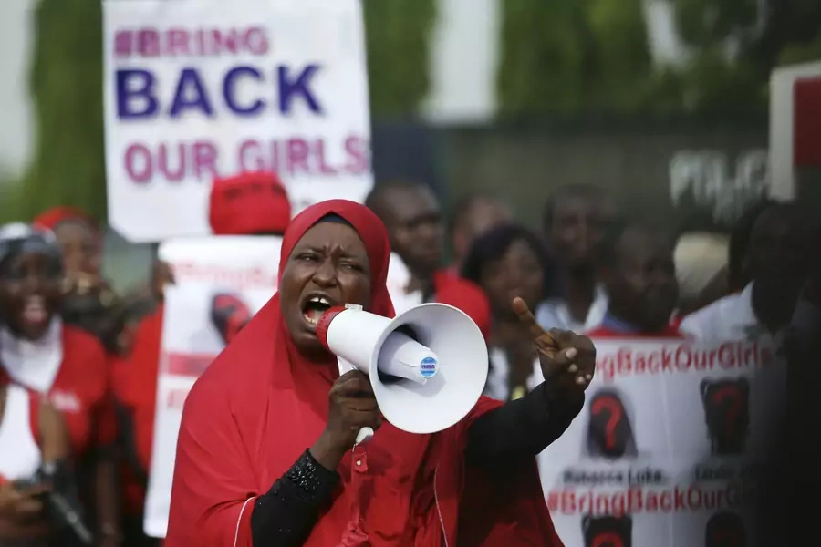 A protester at a "Bring Back Our Girls" protest as they march to the presidential villa to deliver a letter to Nigeria's President Goodluck Jonathan in Abuja, calling for the release of schoolgirls from Chibok kidnapped by Boko Haram, May 22, 2014. 