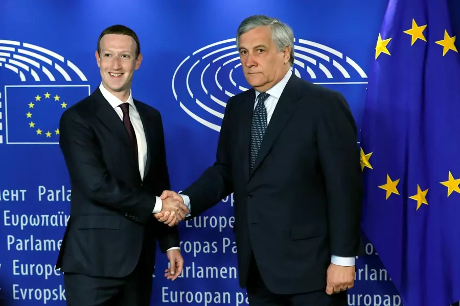 Facebook's CEO Mark Zuckerberg shakes hands with European Parliament President Antonio Tajani at the European Parliament in Brussels, Belgium May 22, 2018.