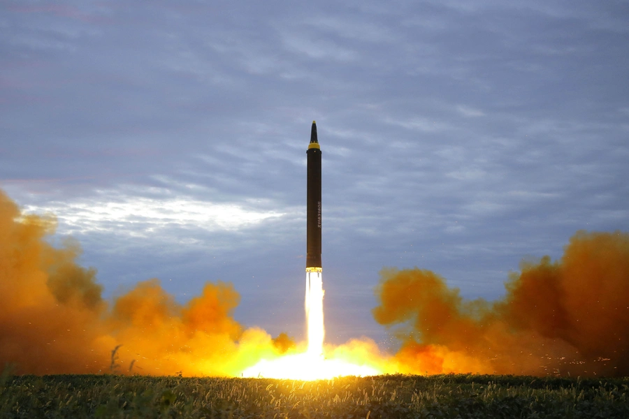 A missile is launched during a long and medium-range ballistic rocket launch drill in this undated photo released by North Korea's Korean Central News Agency (KCNA) in Pyongyang on August 30, 2017.