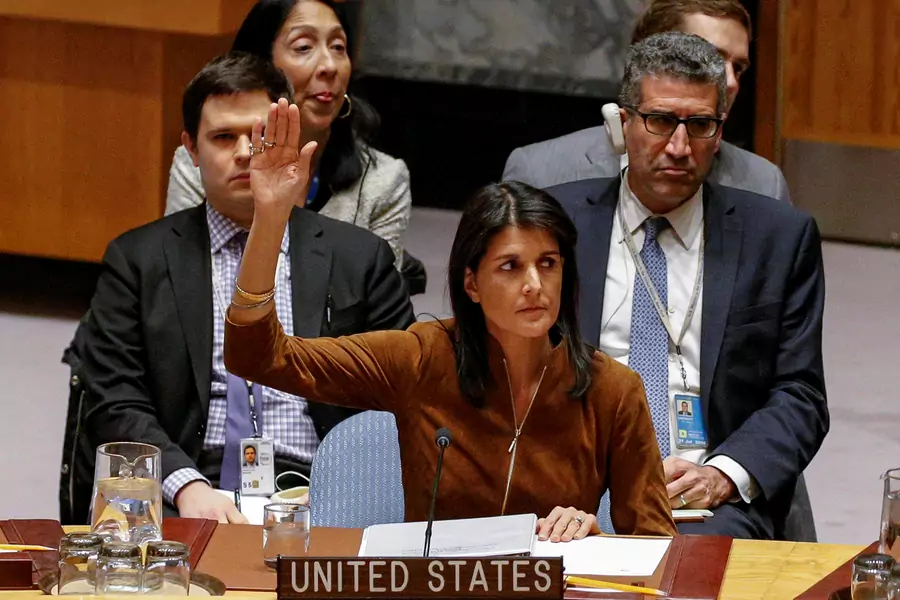 U.S. Ambassador to the United Nations Nikki Haley votes for a bid to renew an international inquiry into chemical weapons attacks in Syria, during a meeting of the U.N. Security Council in New York, November 17, 2017.