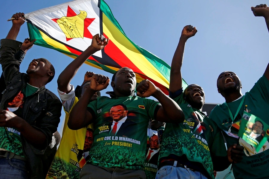 Supporters of President Emmerson Mnangagwa's ZANU PF party gather to march for non-violent, free and fair general elections in Harare, Zimbabwe, June 6, 2018.