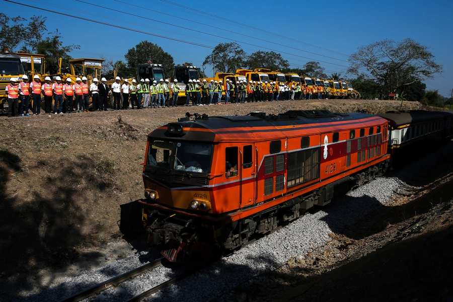 A train runs through during the groundbreaking ceremony of the cooperation between Thailand and China on the Bangkok-Nong Khai high-speed rail development in Nakhon Ratchasima, Thailand on December 21, 2017.