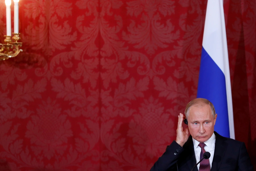 Russia's President Vladimir Putin gestures during a joint news conference with Austria's President Alexander Van der Bellen in Vienna, Austria June 5, 2018