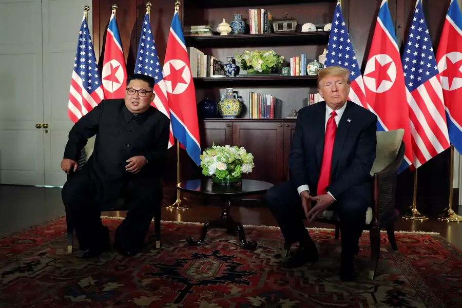 U.S. President Donald Trump and North Korea's leader Kim Jong Un meet in a one-on-one bilateral session at the start of their summit at the Capella Hotel on the resort island of Sentosa, Singapore June 12, 2018. 