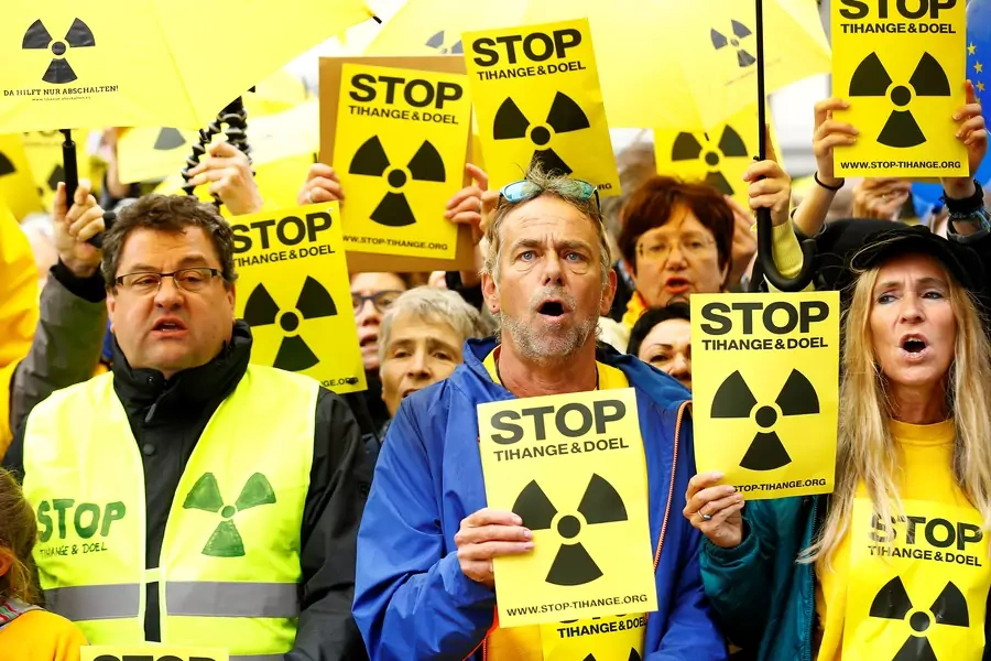 People stage a protest against the nearby Belgian Tihange nuclear power station outside the town hall during a Charlemagne Prize ceremony in Aachen, Germany on May 10, 2018.