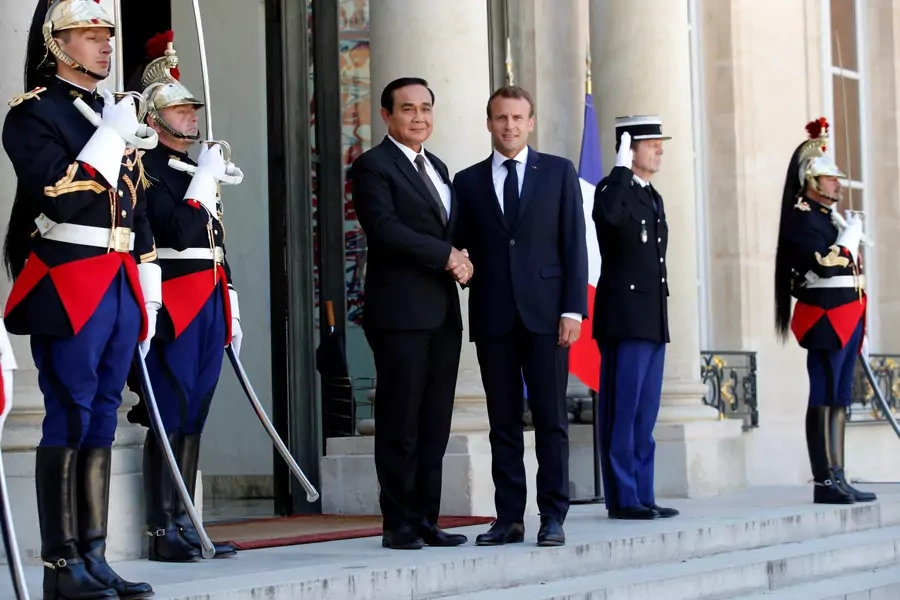 French President Emmanuel Macron welcomes Thailand's Prime Minister Prayuth Chan-ocha at the Elysee Palace in Paris, France, on June 25, 2018.