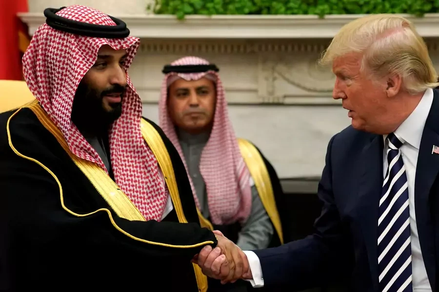 FILE PHOTO: U.S. President Donald Trump shakes hands with Saudi Arabia's Crown Prince Mohammed bin Salman in the Oval Office at the White House in Washington, DC, U.S. March 20, 2018.