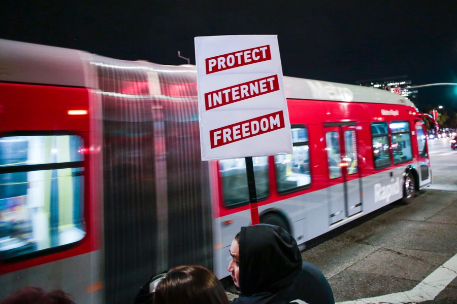 Supporter of Net Neutrality Lance Brown Eyes protests the FCC's recent decision to repeal the program in Los Angeles on November 28, 2017.