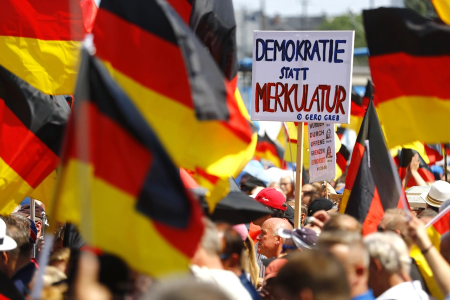 Supporters of the anti-immigration party Alternative for Germany (AfD) hold a protest in Berlin, Germany on May 27, 2018. 