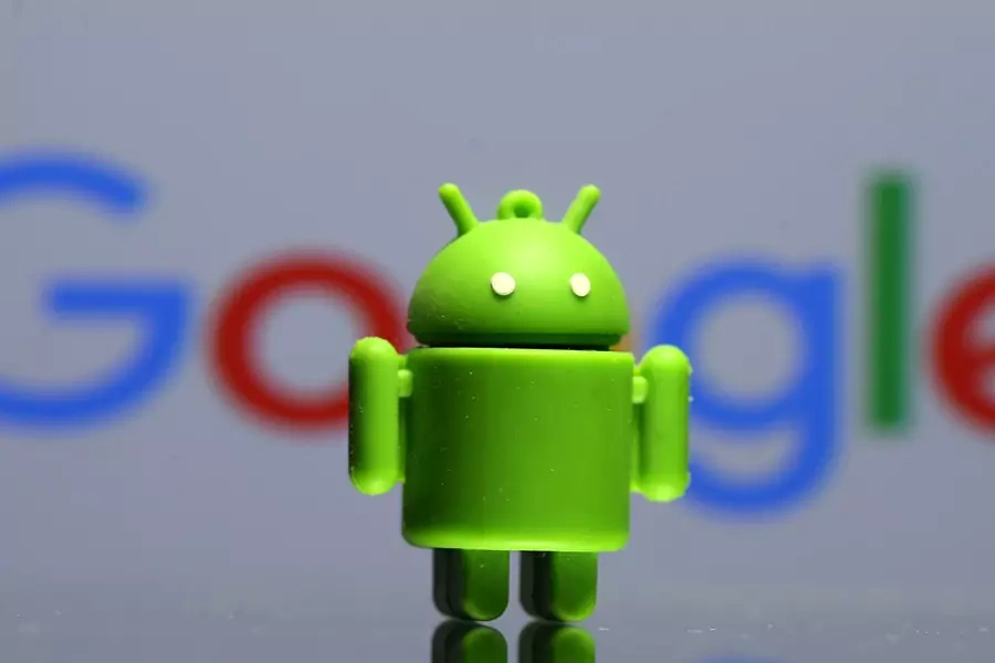 A 3D printed Android mascot Bugdroid is seen in front of a Google logo in this illustration taken on July 9, 2017.