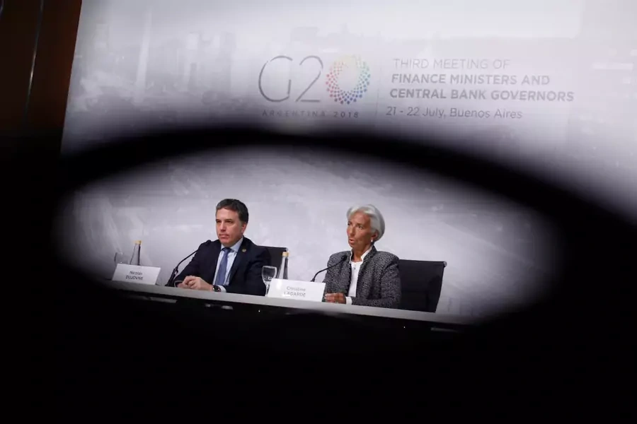 International Monetary Fund (IMF) Managing Director Christine Lagarde and Argentina's Treasury Minister Nicolas Dujovne attend a news conference in Buenos Aires, Argentina, July 21, 2018.
