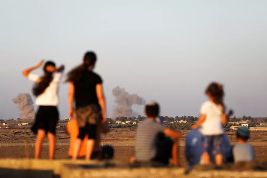 Smoke following an explosion on July 23, 2018, in Syria, as seen from the Israeli-occupied Golan Heights. 