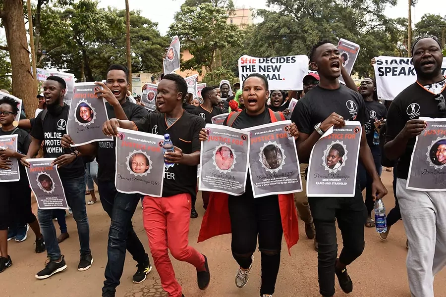 Protesters chant during the womens march demanding police action to stop a spate of kidnapings and murders of women in Kampala, Uganda, on June 30, 2018. 