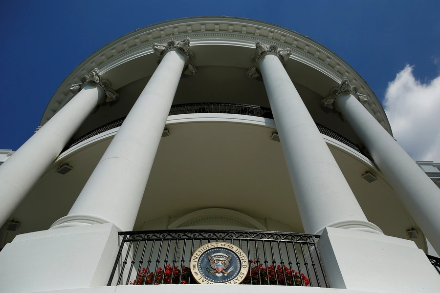 The White House’s Truman Balcony and the Presidential seal. 