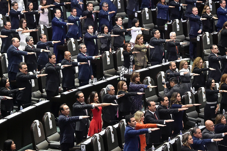 Mexican deputies swear in, during the inauguration of the new legislature at the Congress in Mexico City, on August 29, 2018.