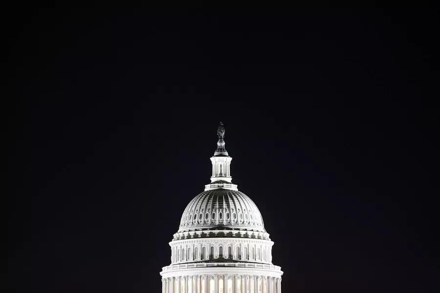 The U.S. Capitol dome is pictured in the pre-dawn darkness in this general view taken on October 18, 2013.