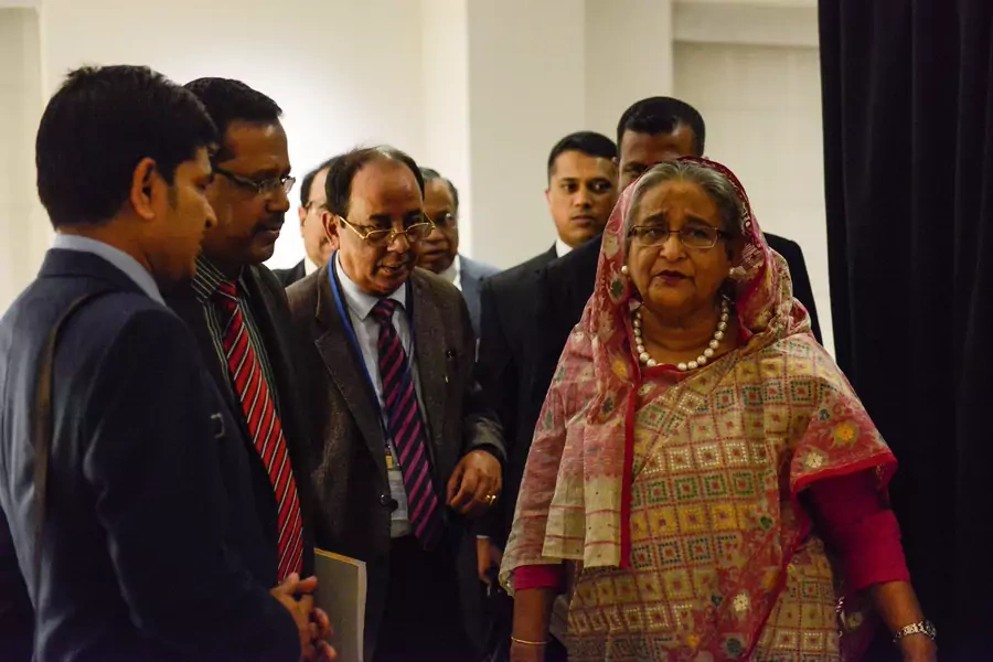 Bangladesh's Prime Minister Sheikh Hasina consults with her team during the United Nations General Assembly in New York City. 