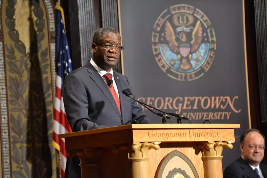 Dr. Denis Mukwege receives the Hillary R. Clinton Award for Advancing Women in Peace and Security, February 2014. 