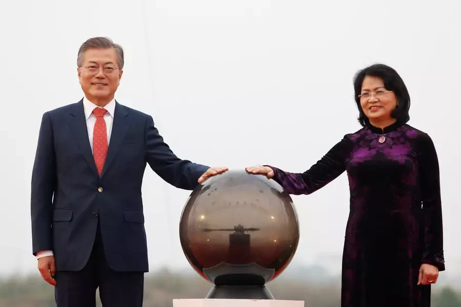 South Korea's President Moon Jae-in (L) and Vietnam's Acting President Dang Thi Ngoc Thinh attend the breaking ceremony of the Vietnam Korea Institute of Science and Technology in Hanoi, Vietnam.