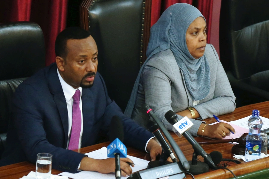 Ethiopia's Prime Minister Abiy Ahmed, and Muferiat Kamil, newly-named Minister of Peace, address members of parliament.