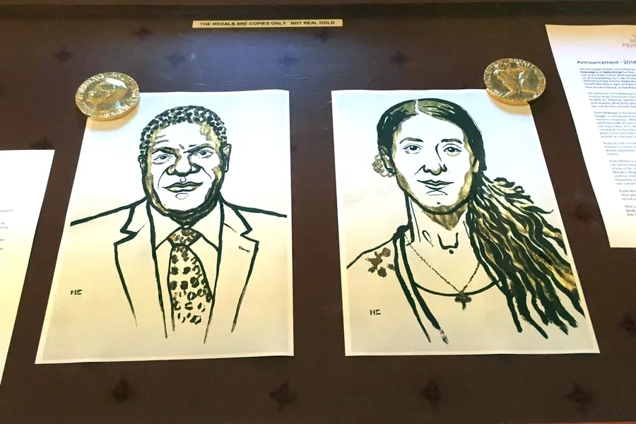 Drawings of the Nobel Peace Prize winners Denis Mukwege and Nadia Murad are displayed in Oslo, Norway.