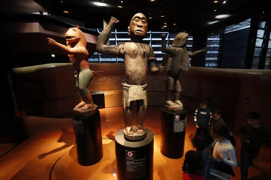 Three large royal statues of the Kingdom of Dahomey, located in present-day Benin, are displayed at the Quai Branly Museum in Paris, France, November 23, 2018. 