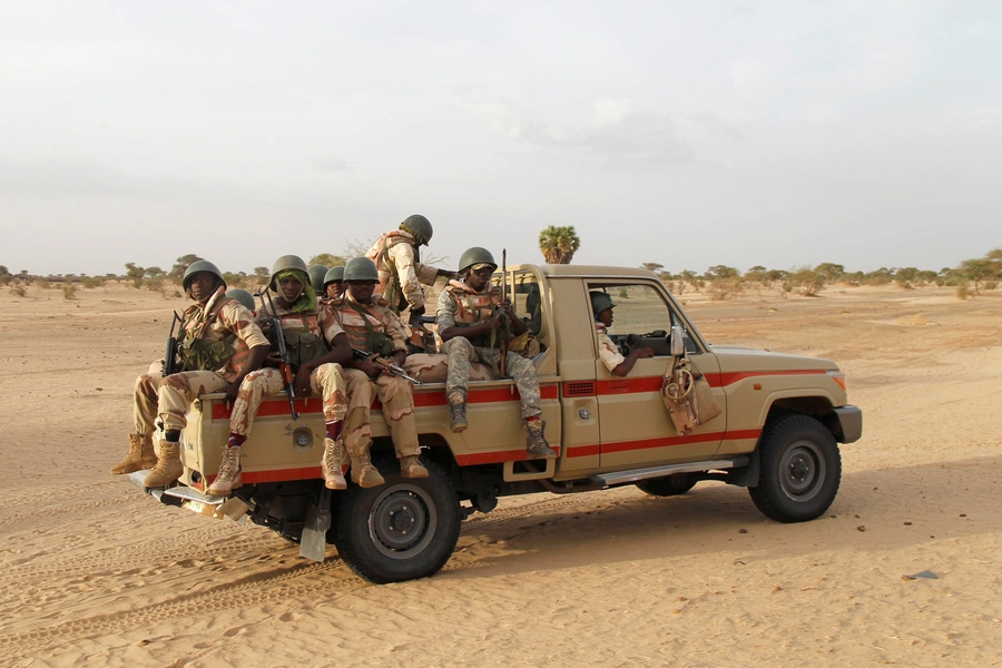 Nigerien soldiers patrol at the border with neighbouring Nigeria near the town of Diffa, Niger, June 21, 2016.