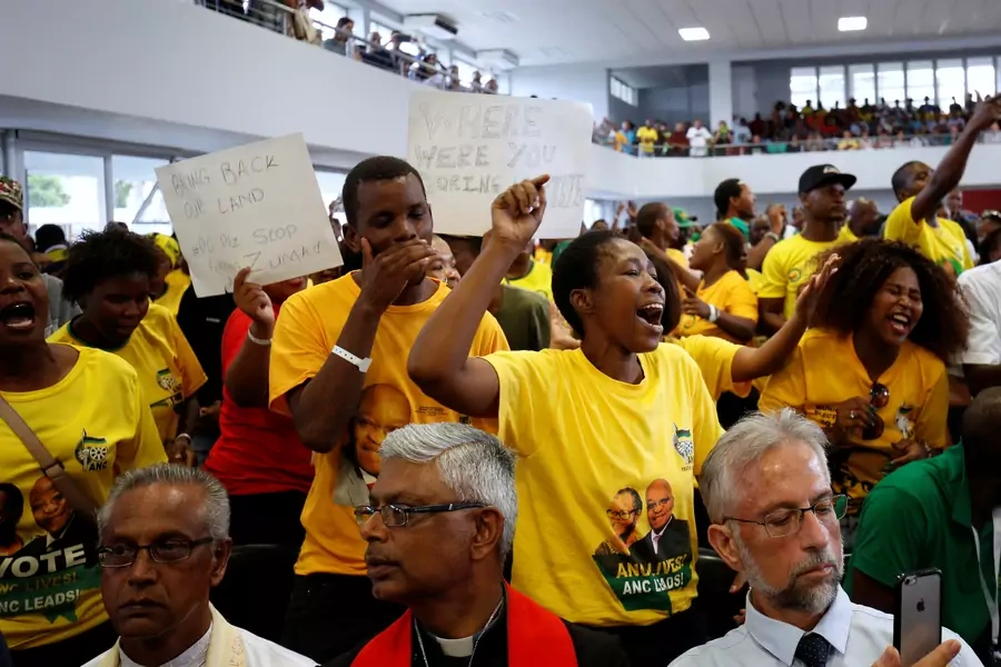 African National Congress Youth League members interrupt a memorial service for anti-apartheid activist Ahmed Kathrada in Durban, South Africa, April 9, 2017.