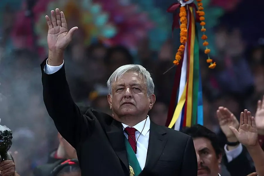 Mexico's President Andres Manuel Lopez Obrador takes part in an indigenous ceremony during the AMLO Fest at Zocalo square in Mexico City, Mexico.