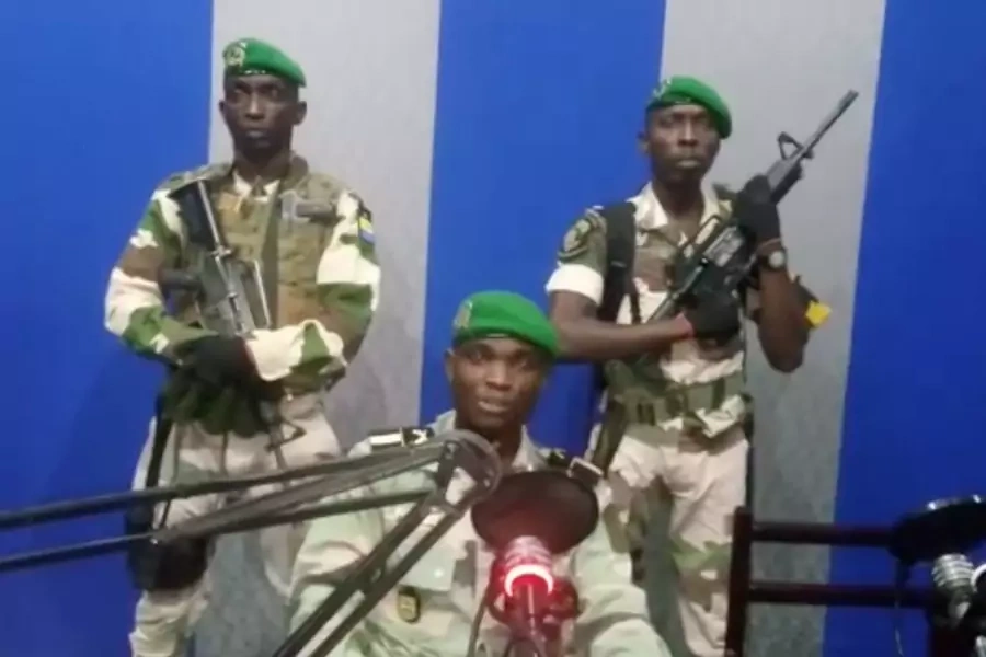 A still image taken from a video posted on January 7, 2019, shows military officers giving a statement from a radio station in Libreville, Gabon.