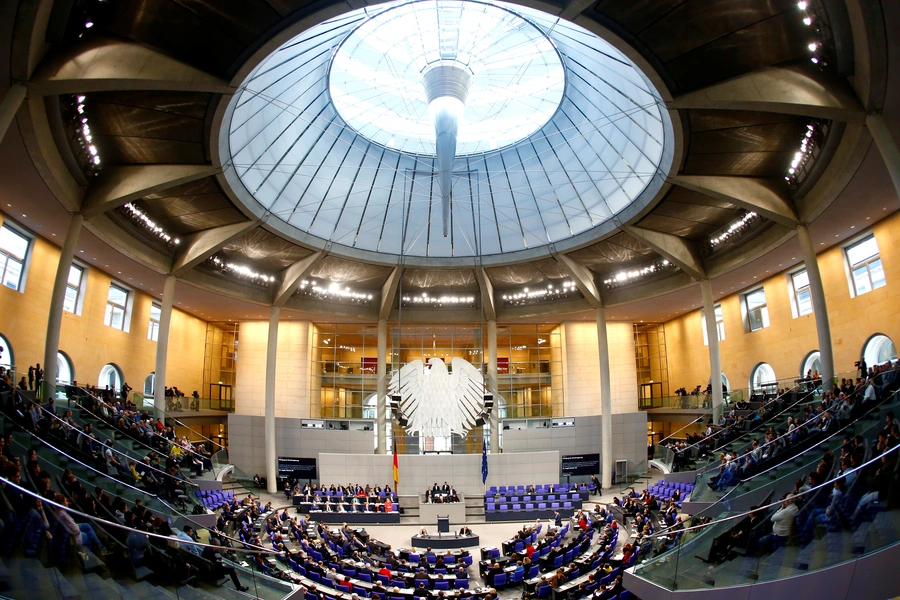 German Chancellor Angela Merkel addresses the lower house of parliament Bundestag in Berlin