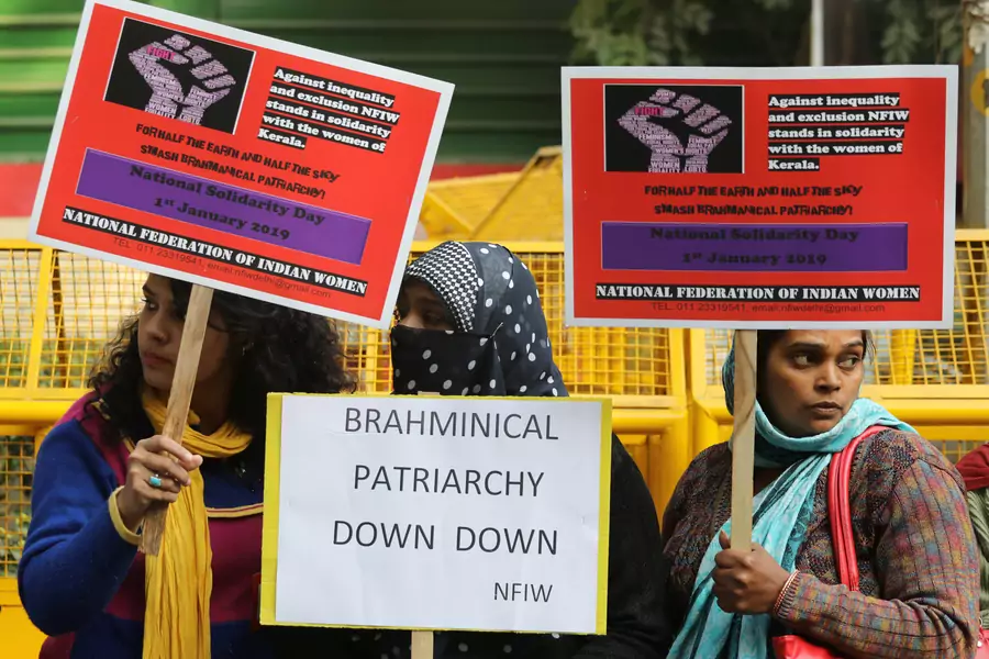 Women hold placards in a solidarity rally in support of "Women's Wall" organised by the women in the southern state of Kerala to pledge for gender equality in the southern state.