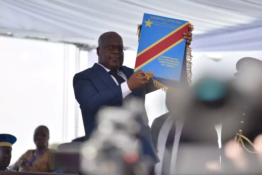Felix Tshisekedi holds up the constitution during the inauguration ceremony whereby Tshisekedi was sworn into office as the new president of the Democratic Republic of Congo in Kinshasa, Democratic Republic of Congo, on January 24, 2019.