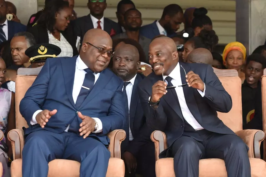 Democratic Republic of Congo's outgoing President Joseph Kabila sits next to his successor Felix Tshisekedi during an inauguration ceremony whereby Tshisekedi will be sworn into office as the new president of the Democratic Republic of Congo.