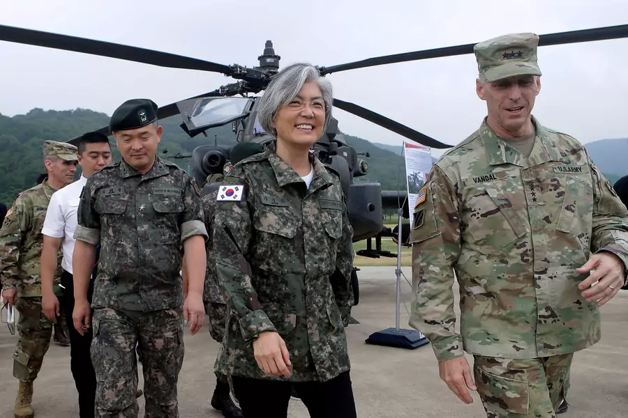 South Korean Foreign Minister Kang Kyung-wha talks with Lieutenant General Thomas Vandal, former commander of the U.S. 8th Army, as she visits the South Korea-U.S. Combined 2nd Infantry Division headquarters in Uijeongbu, South Korea on June 25, 2017.